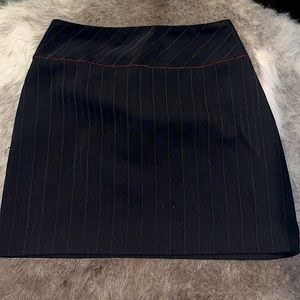 Black mini skirt with red pin stripes. Fashion bug